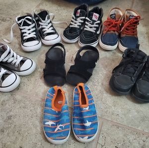 7 pairs of little boy shoes